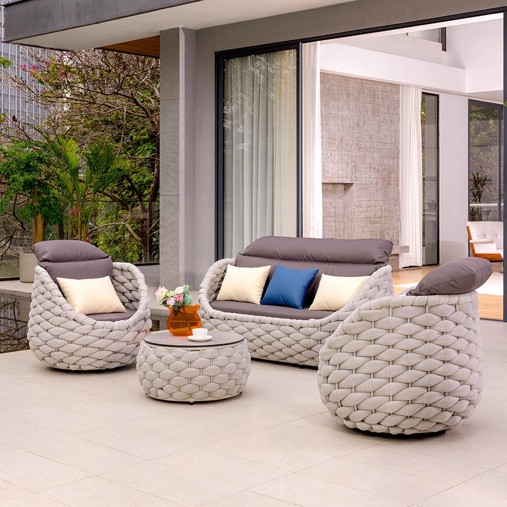 4-zits grijs geweven tuinmeubilair met draaistoelen Vensterafbeelding