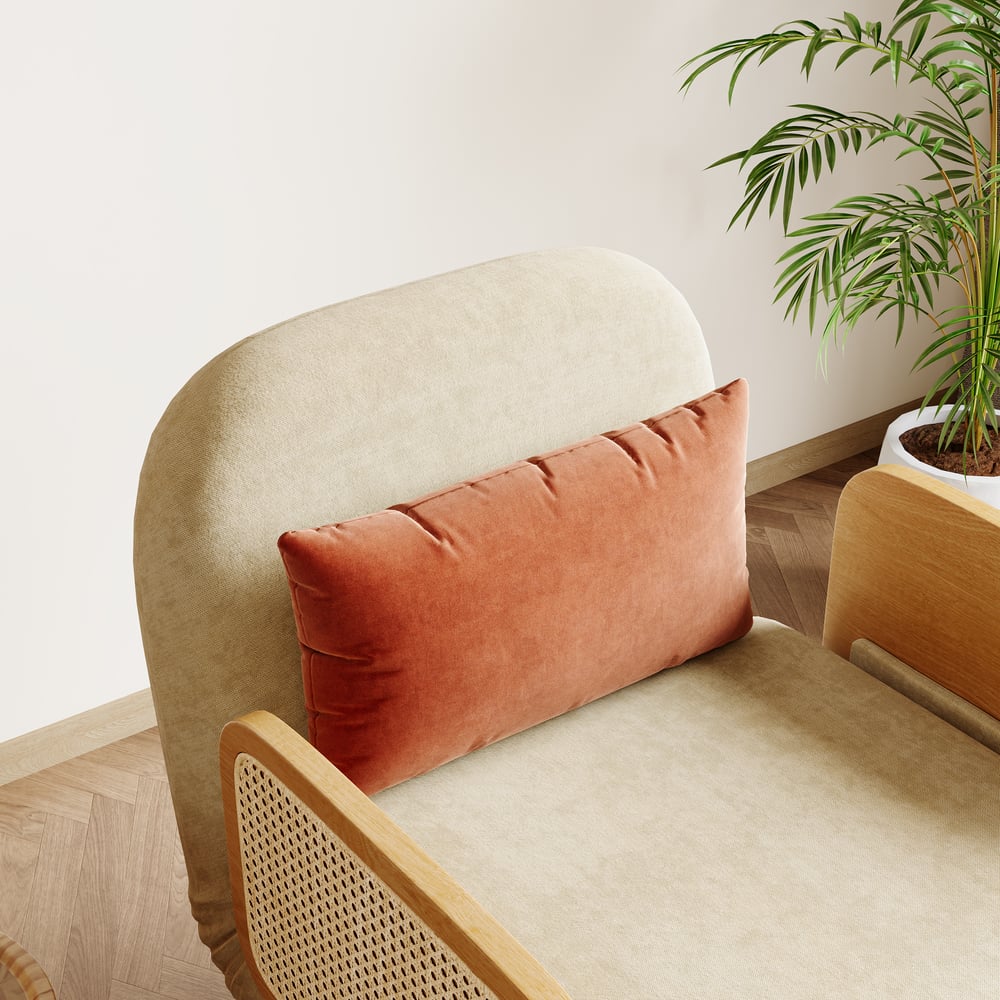 Fauteuil van beige fluweel en rotan Vensterafbeelding