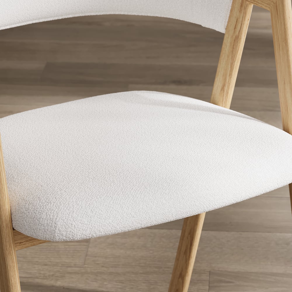 Sedia da pranzo moderna in bouclé con seduta imbottita in bianco caldo, set da 2 Immagine della finestra