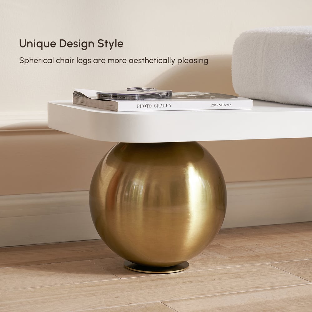 White and gold wooden bench with bouclé upholstery and abstract metal legs window image