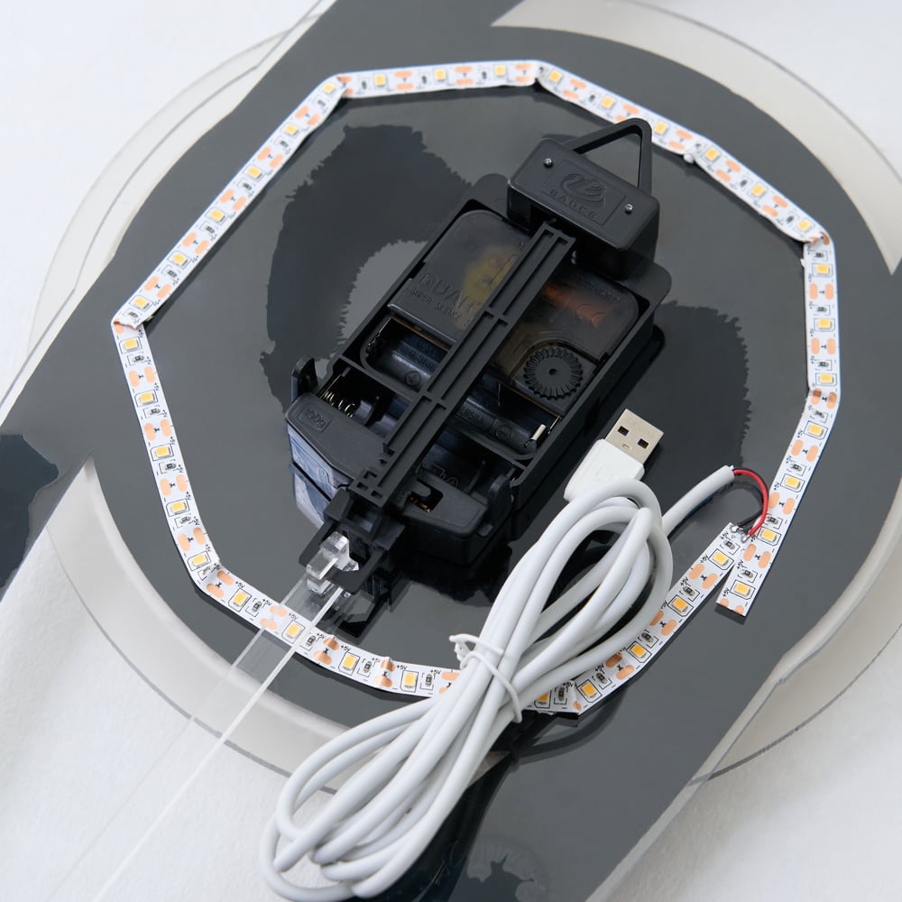 Modern Wall Clock with LED and Pendulum, Plug-in LED Light, Battery-Operated Clock