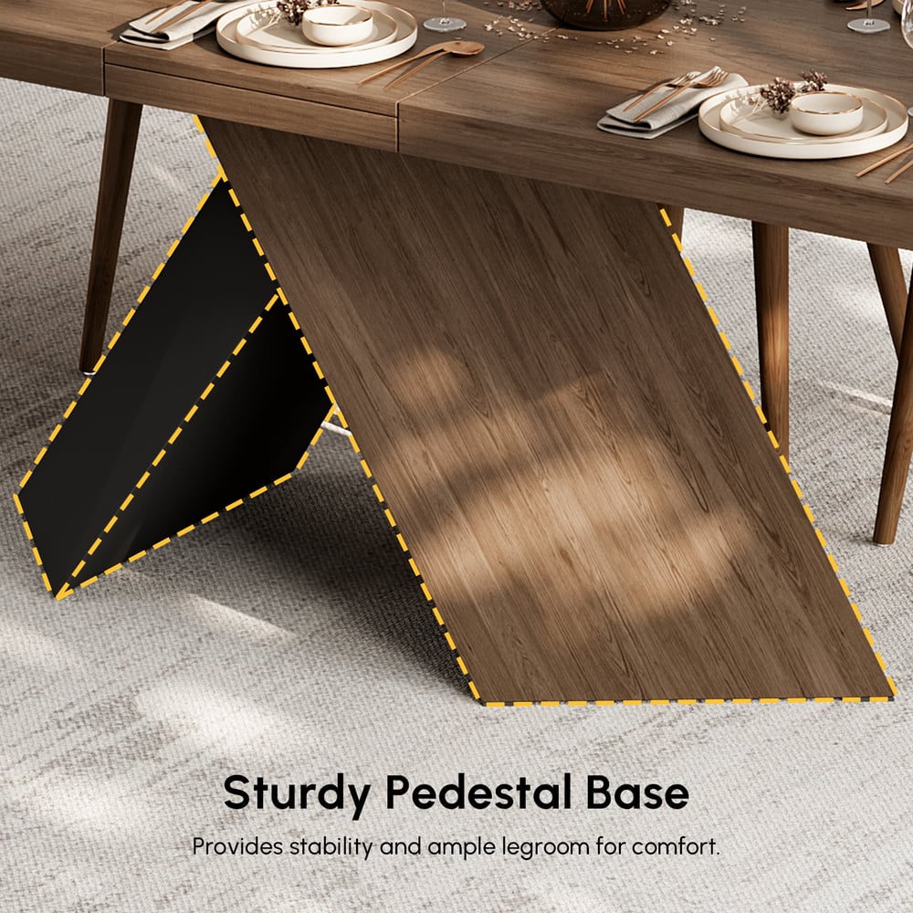 Expandable walnut dining table with pedestal base for 6 to 8 seats window image