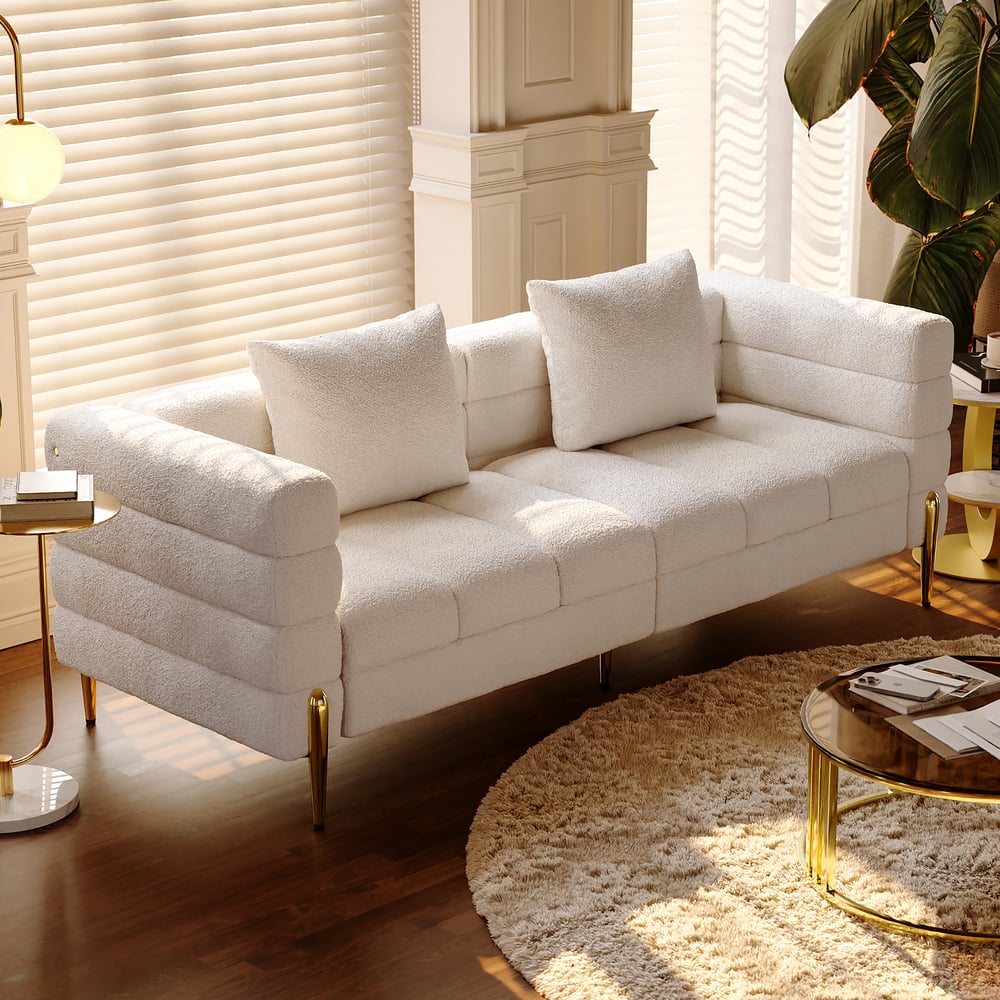 Customer Reviews for Aurora 79" Boucle Fluted Sofa with Gold Legs & Pillows