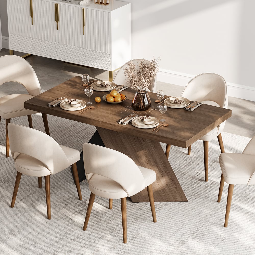 Expandable walnut dining table with pedestal base for 6 to 8 seats window image