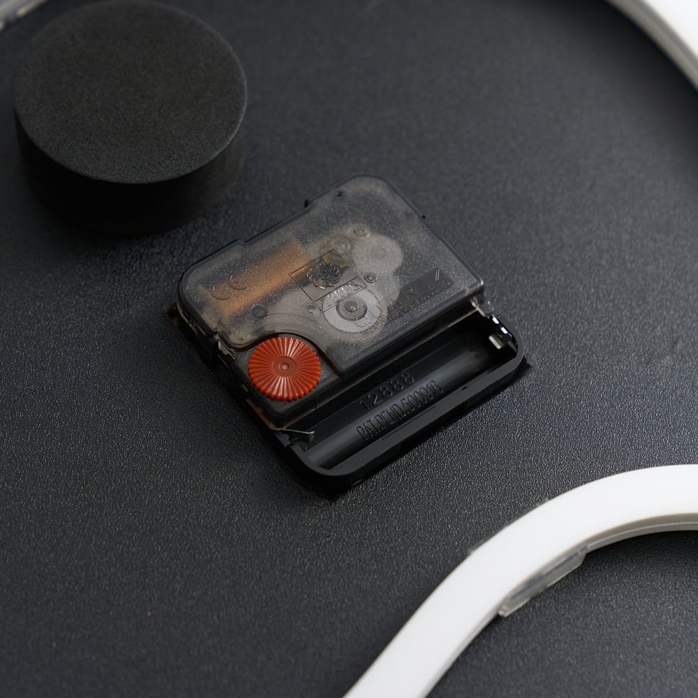 Modern LED Wall Clock with Remote Control – 39.4×16.1" Decorative Lighted Wall Clock window image