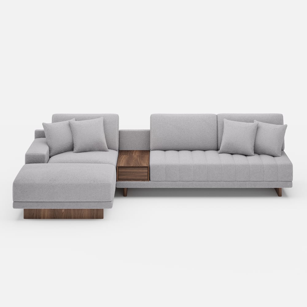 Sofá modular en forma de L Vewal de 320 cm en tela bouclé con chaise longue y otomana Imagen de ventana