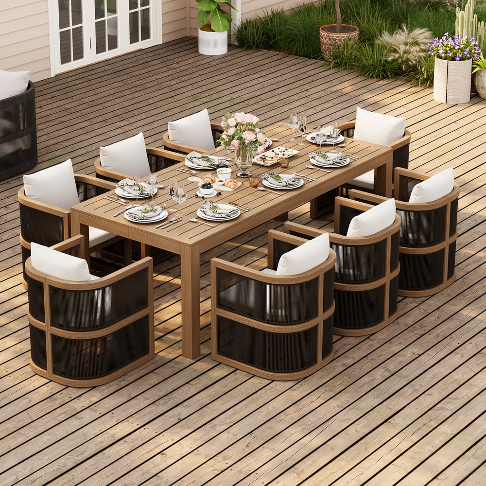 Table à manger d’extérieur Wevara 220 cm en aluminium à lattes finition noyer image de fenêtre