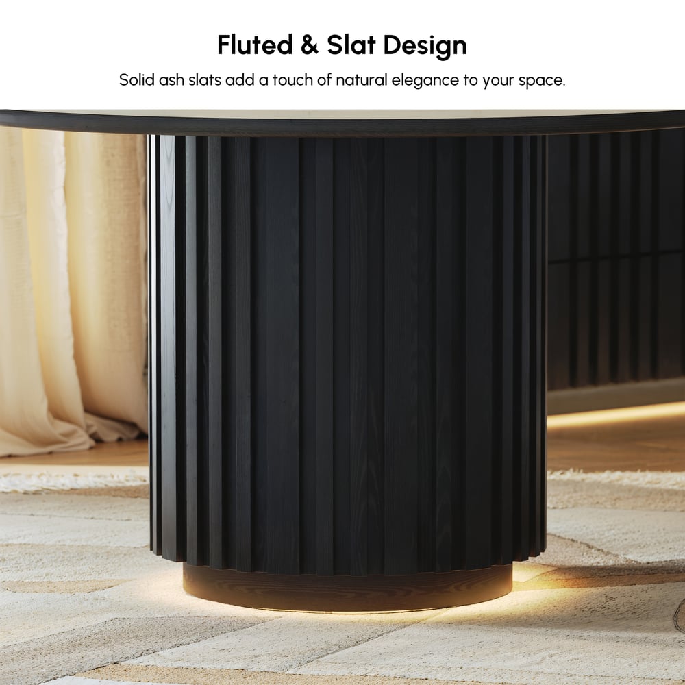 Aura 47" Round Black Faux Travertine Sintered Stone Dining Table, Fluted Base, Seats 4 window image