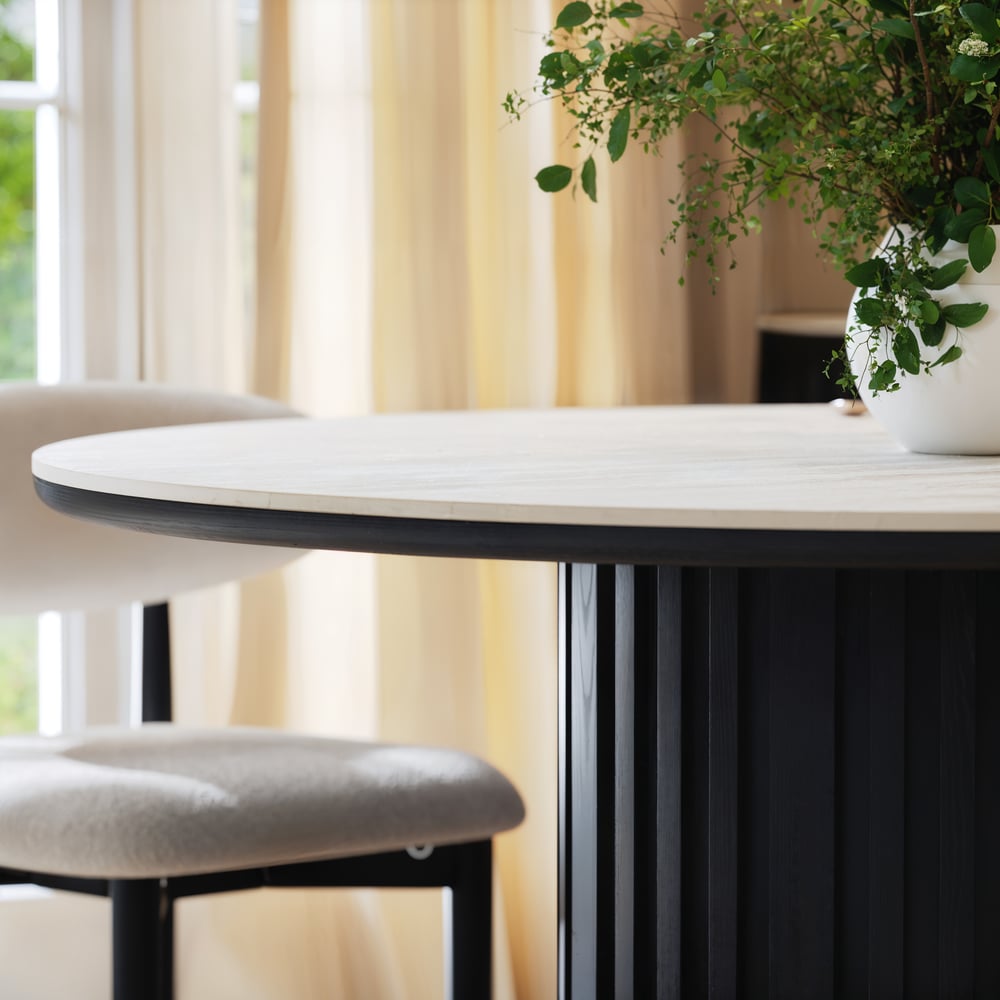 Aura 47" Round Black Faux Travertine Sintered Stone Dining Table, Fluted Base, Seats 4 window image