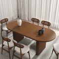63"-79" Japandi Style Oval Extendable Dining Table Walnut Seats 6-8 People