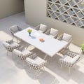 9-Pieces Extendable White Marble Outdoor Dining Set with Woven Armchairs (64.2"-84.3")