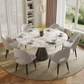 Moderne ronde eetkamertafel van 152 cm met glanzend gesinterd stenen blad en zwarte voet, geschikt voor 6 personen