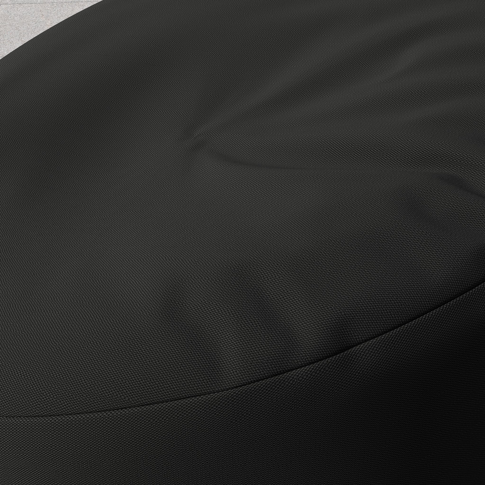 Close-up detail of black outdoor cover fabric texture.