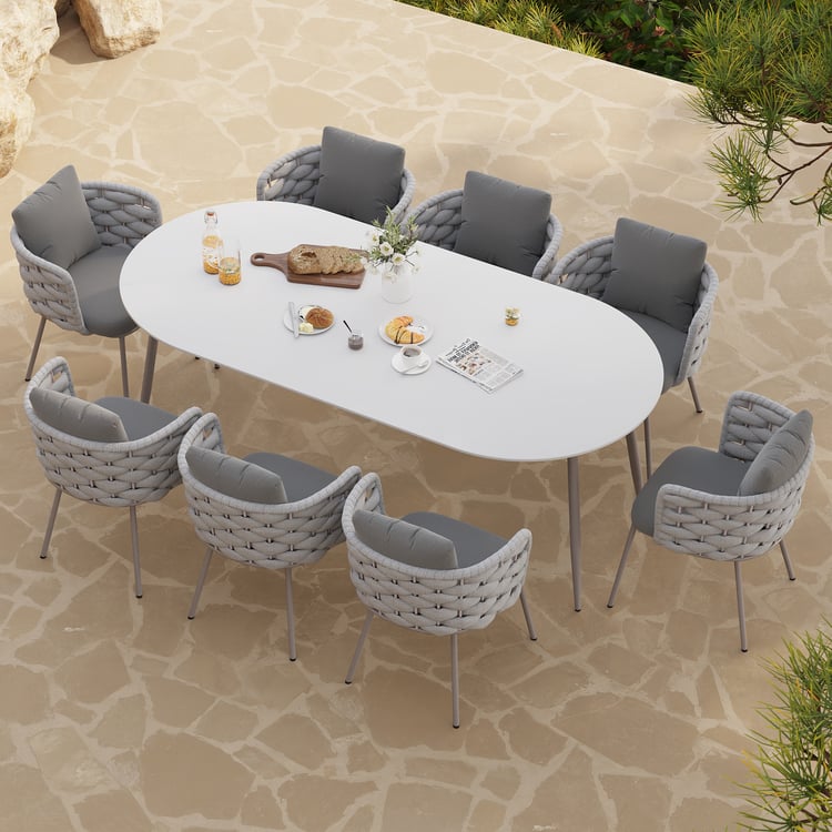 Ensemble de salle à manger d'extérieur 9 pièces avec dessus de table ovale en faux marbre et fauteuil tressé