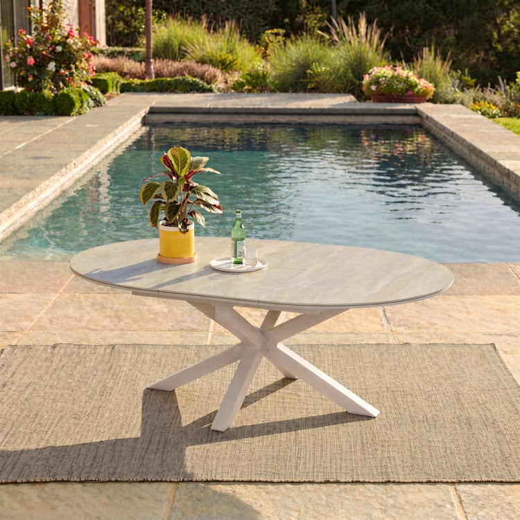 Table à manger extensible d'extérieur en aluminium et pierre frittée couleur sable