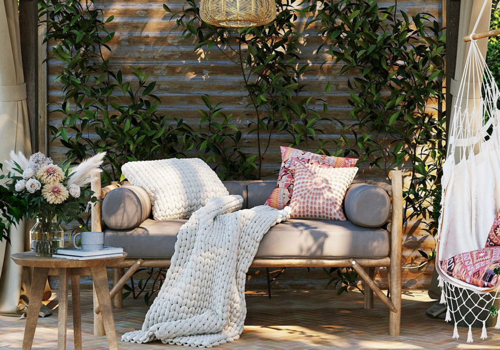 a couch with pillows and a table